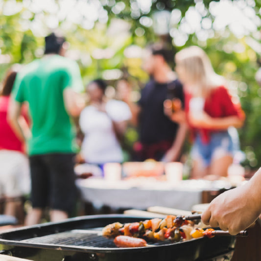 BBQ grill with people in background